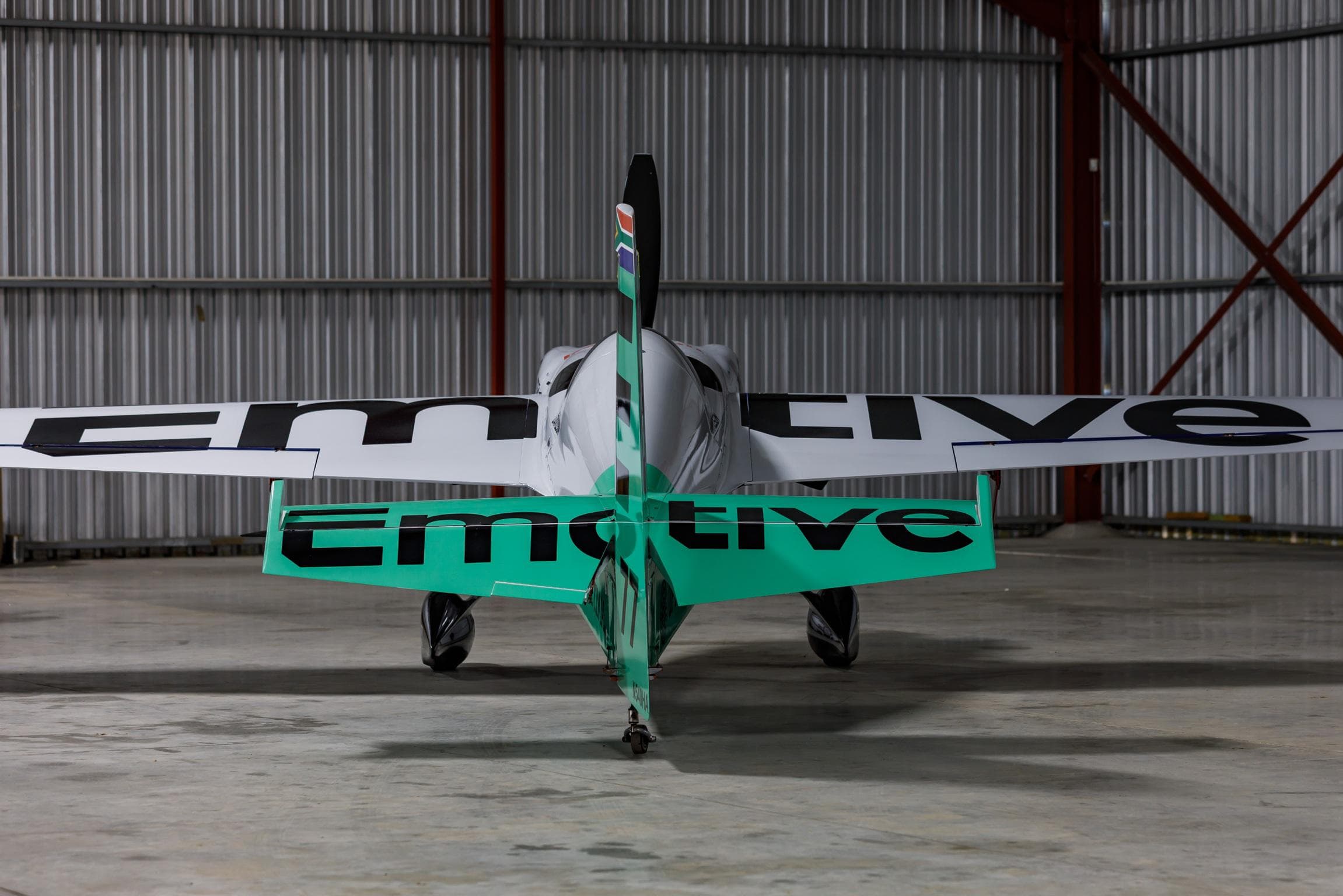 Air Race X plane in hangar